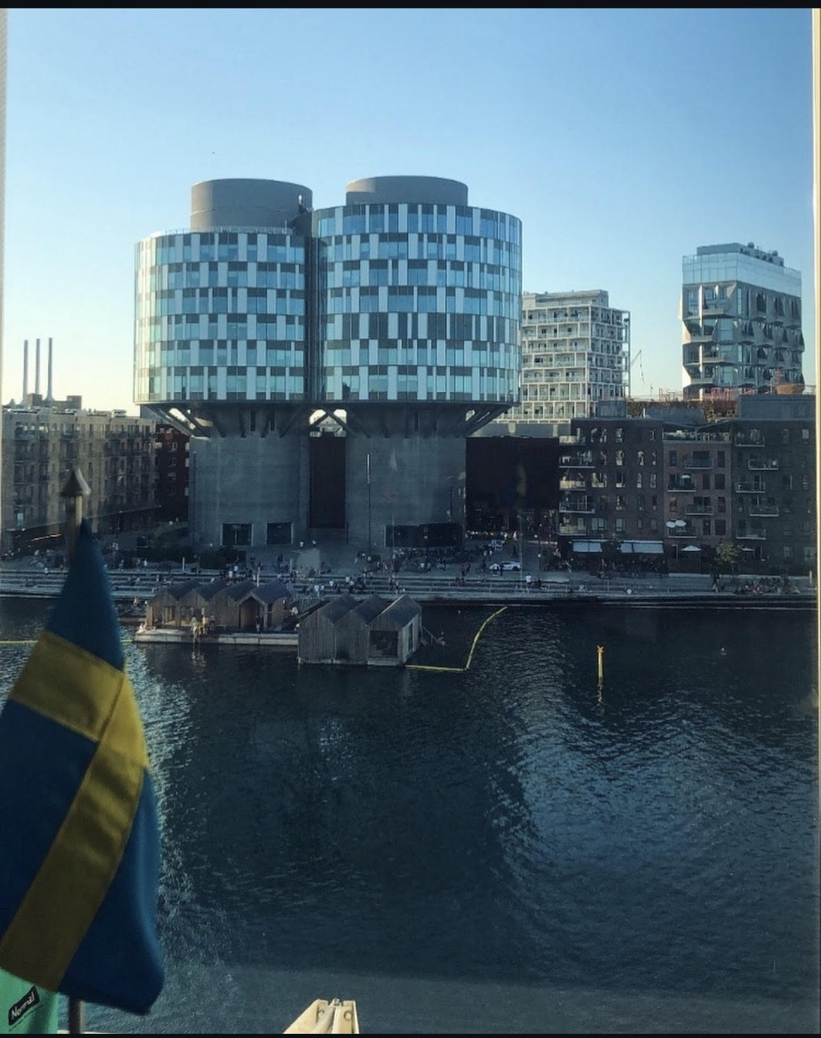 View over Stockholm harbour with Swedish flag